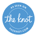 A blue circle with the word " the knot ".