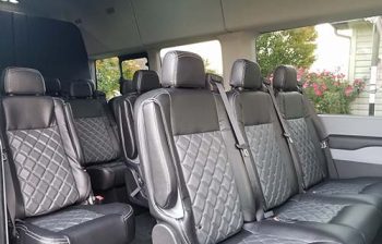 A van with many seats in the back